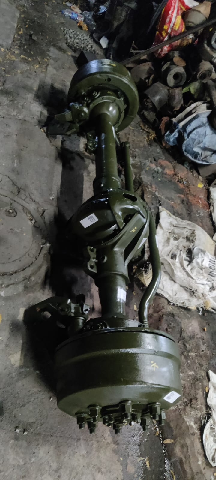 Mechanical axle assembly on a concrete floor