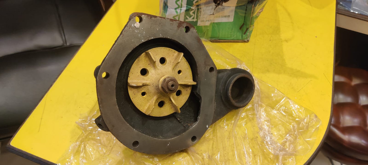 Mechanical component on a yellow surface with a plastic bag