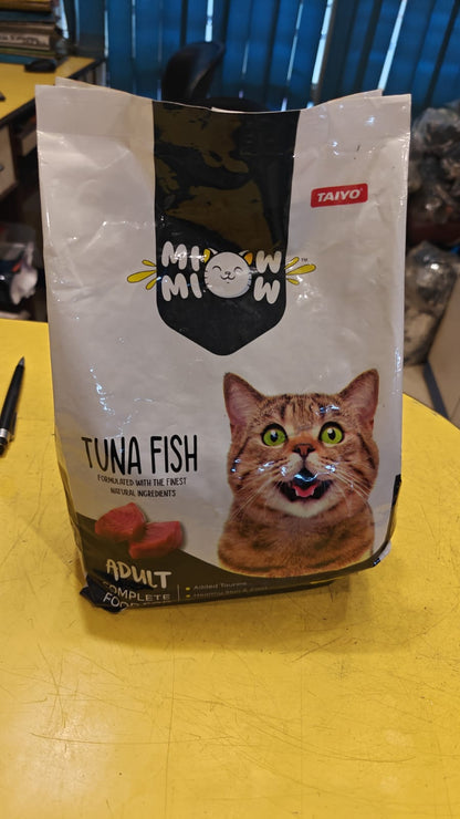 Cat food package with tuna fish flavor on a yellow surface