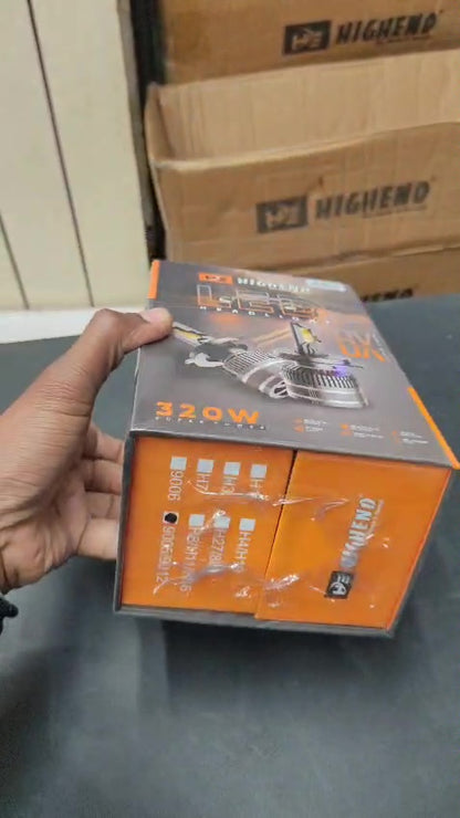 Hand holding a box of a high-power LED light bulb with 'HIGHERND' branding.