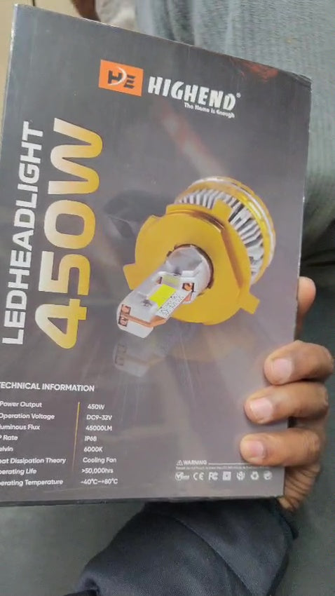HighEnd LED headlight bulb packaging held by a person