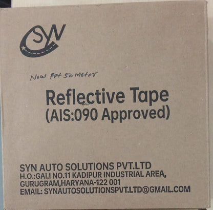 Cardboard box with reflective tape packaging and SYN AUTO SOLUTIONS PVT.LTD branding.