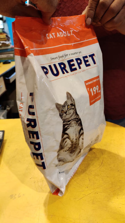 Bag of Purepet cat food on a yellow surface