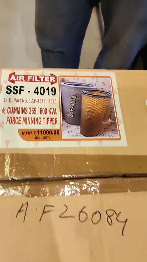 Air filter box with label and packaging on a blurred background