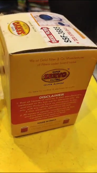Box with red and white label on a yellow background