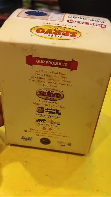 Box of Super Saver oil filters on a yellow background