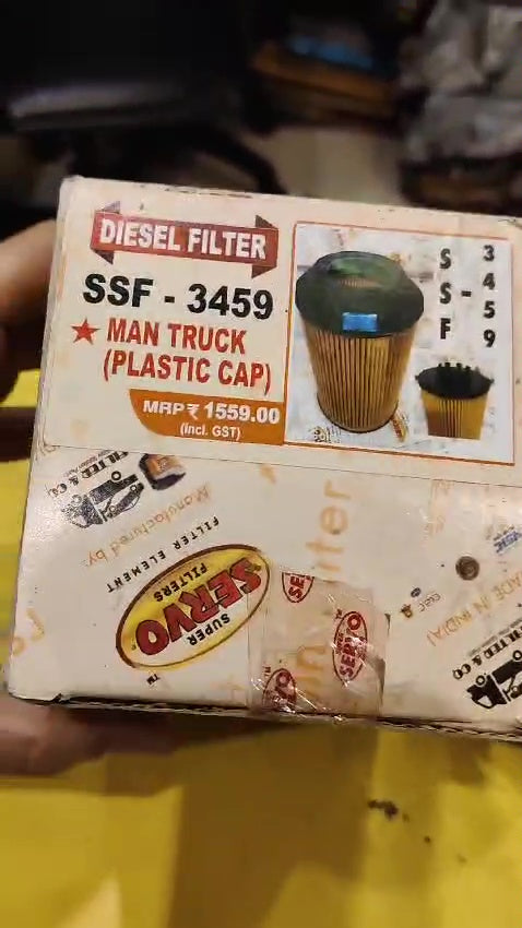 Box of diesel filter with branding and product details on a yellow background